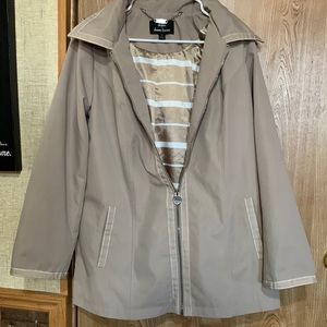 Dennis Basso medium tan leather jacket, with silky beautiful lining.